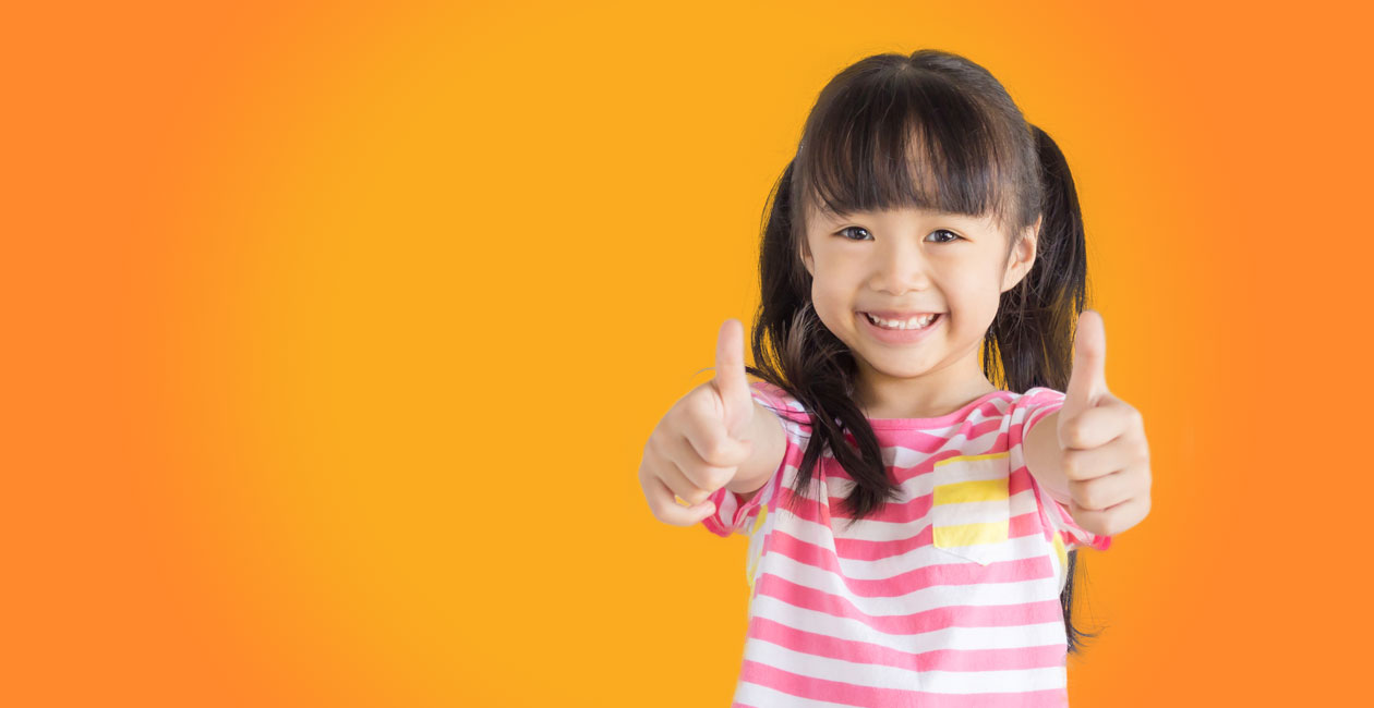 Asian decent girl with 2 thumbs up